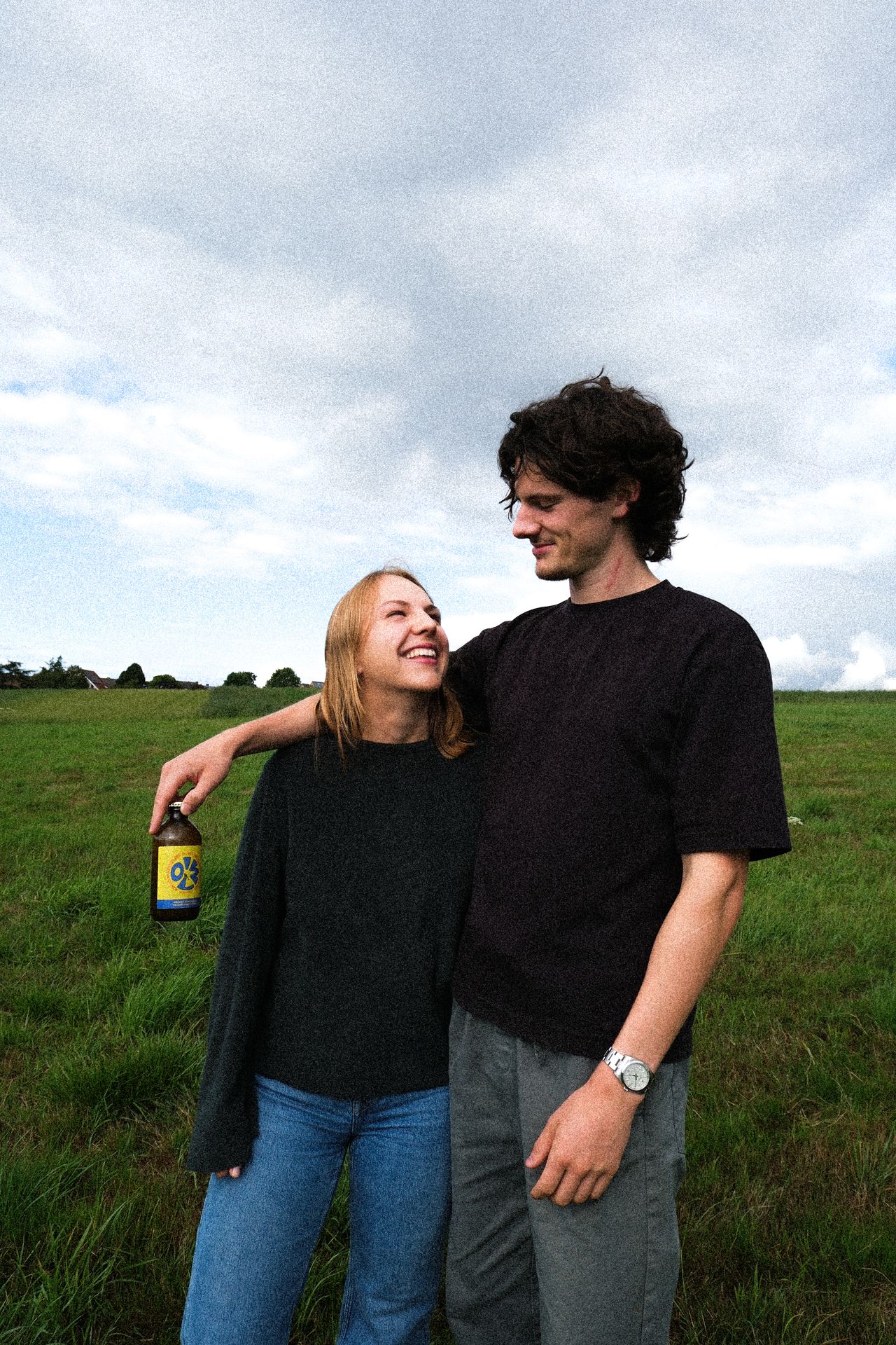 two people enjoying olmi ginger beer